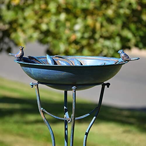 Decorative bird bath with two small bird sculptures