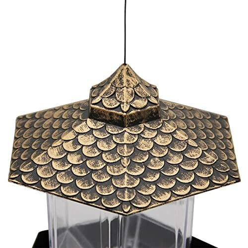 Decorative metal lantern top with textured pattern