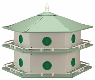 Green two-story birdhouse with circular openings.