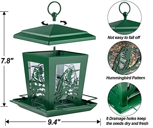 Green bird feeder with hummingbird pattern and drainage holes.