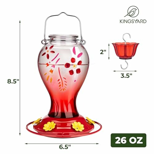 Red glass hummingbird feeder with floral design, capacity 26 oz.