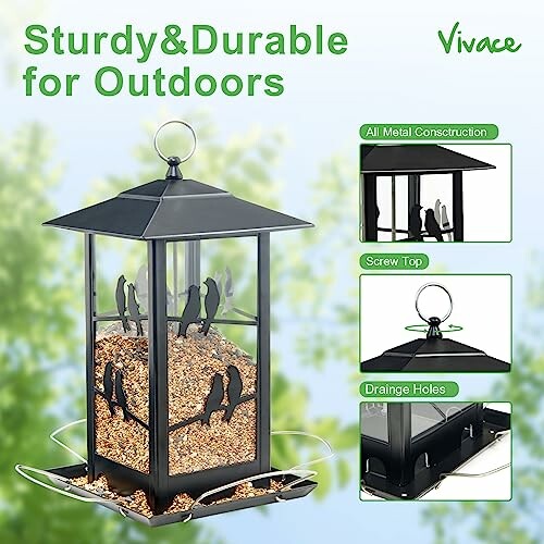 Metal bird feeder with seeds, sturdy and durable design for outdoors.