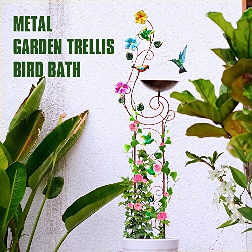 Decorative metal garden trellis with bird bath and flowers.