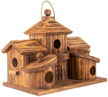 Rustic wooden birdhouse with multiple openings and rooftops.