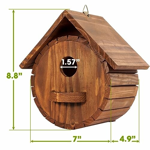 Wooden birdhouse with dimensions labeled