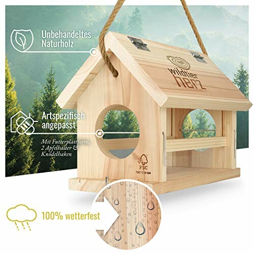 Wooden birdhouse with German text and forest background