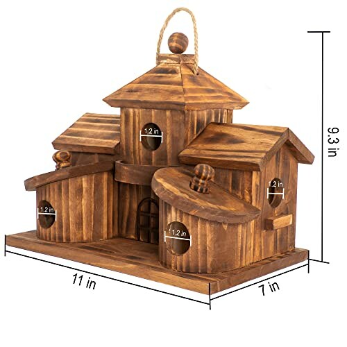 Wooden birdhouse with multiple entry holes and dimensions labeled.