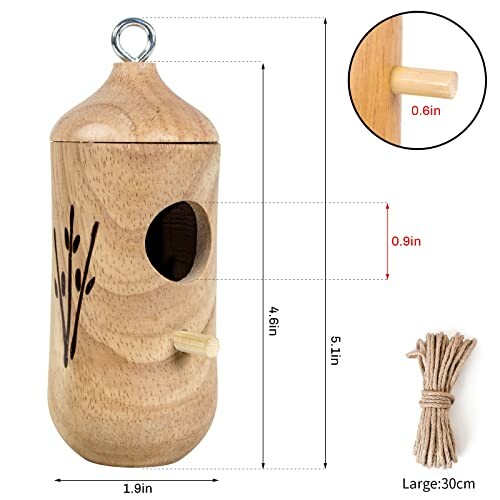 Wooden birdhouse with entry hole and decorative carvings, includes rope.