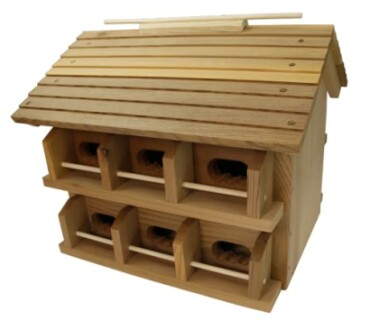 Two-story wooden birdhouse with multiple compartments